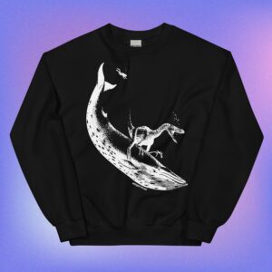 Look! It's a raptor riding a whale on a crew neck sweater.